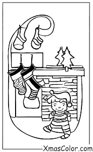 Noël / Enfants: Un enfant qui accroche ses chaussettes au-dessus de la cheminée