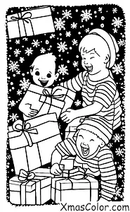 Noël / Noël aux États-Unis: Un enfant ouvrant un cadeau de Noël